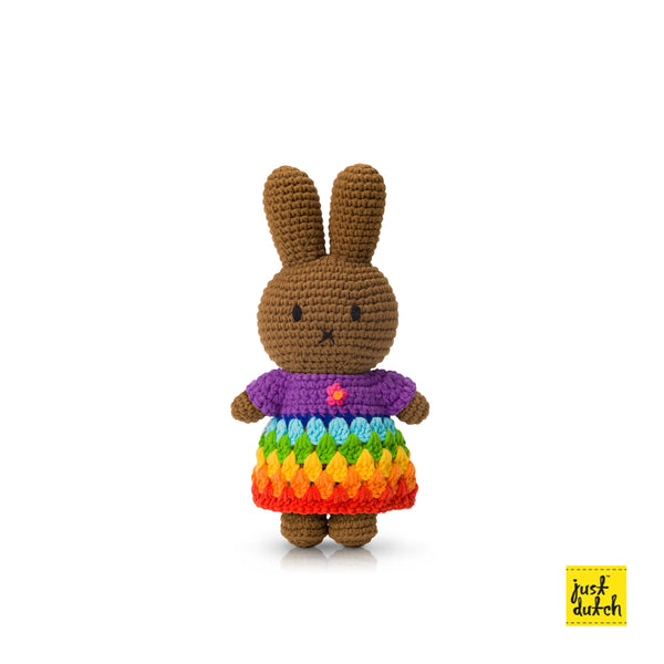 melanie crochet doll wearing rainbow dress handmade colorful soft toy